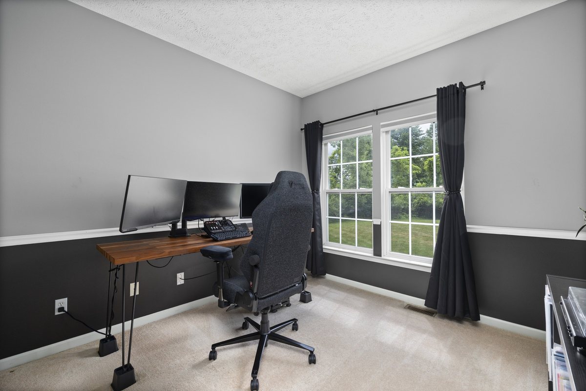 Den window wall with double window and chair rail