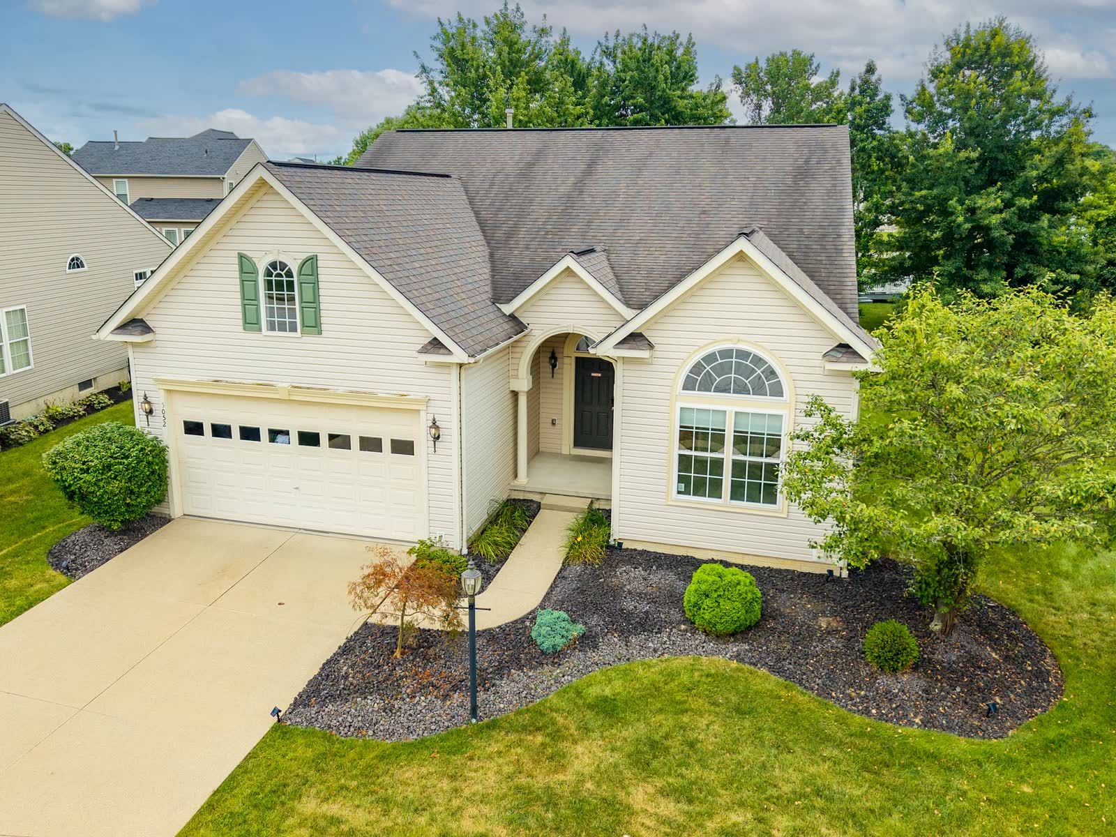 Aerial front view of 5052 Forestland Ct, a single-floor ranch in Brunswick, Ohio